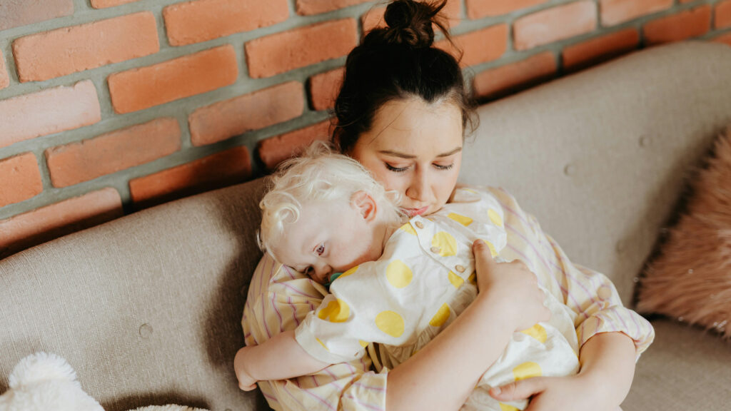 parent and young child embrace